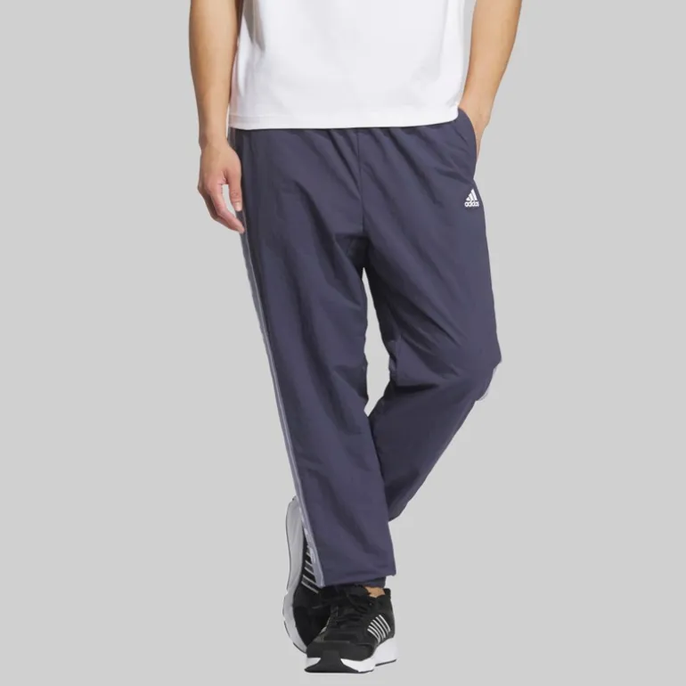 adidas Herren Schriftzug locker geschnittene gewebte Trainingshose Shadow Navy
