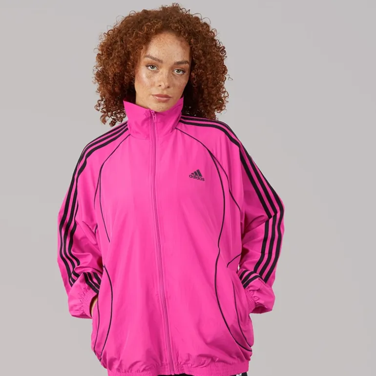 adidas Originals Damen Teamgeist Adicolor Oversized Gewebtes Durchgehendes Reißverschluss Trainings Oberteil Semi Lucid Fuchsia/Schwarz